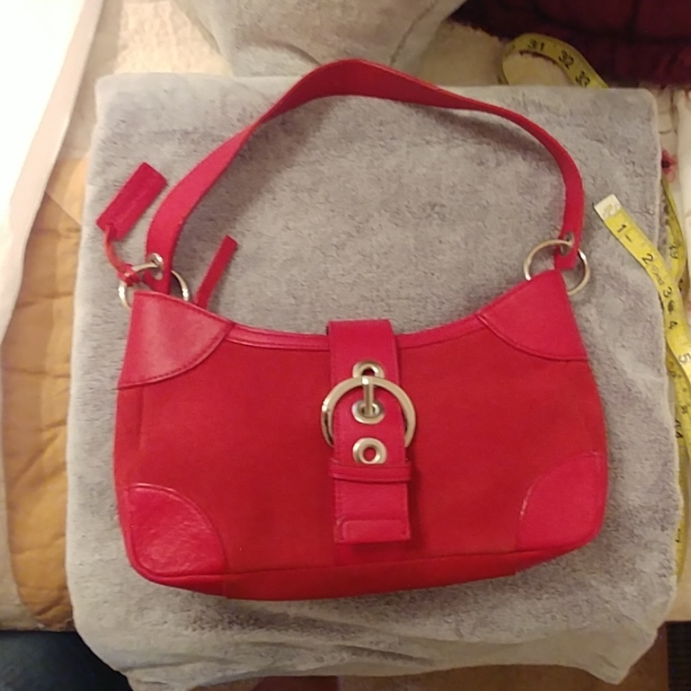 Red leather handbag